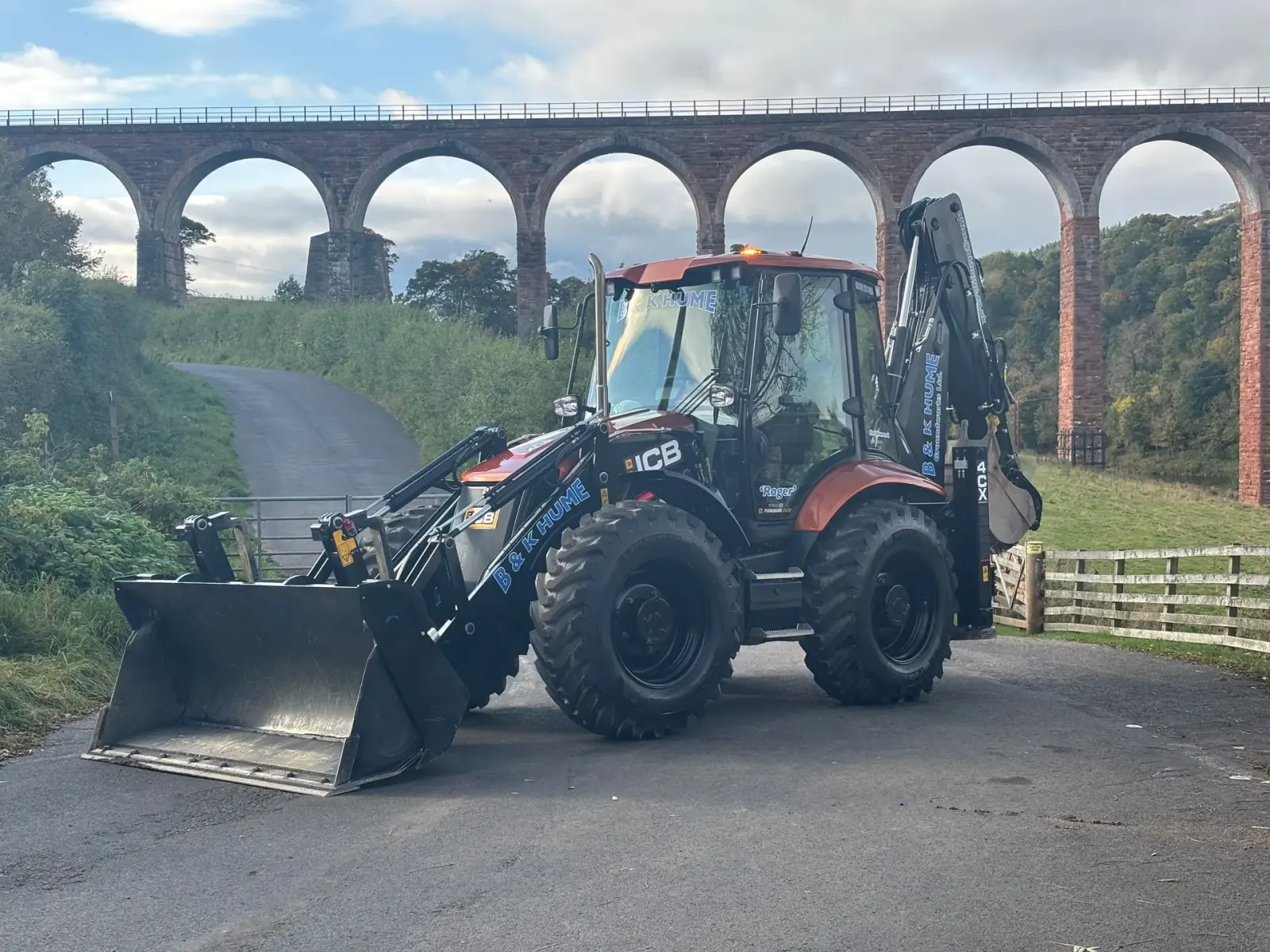 B&K Hume JCB 4CX backhoe loader beneath Leaderfoot Viaduct in the Scottish Borders